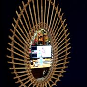 Oval shaped sun mirror in vintage rattan 1960/1970