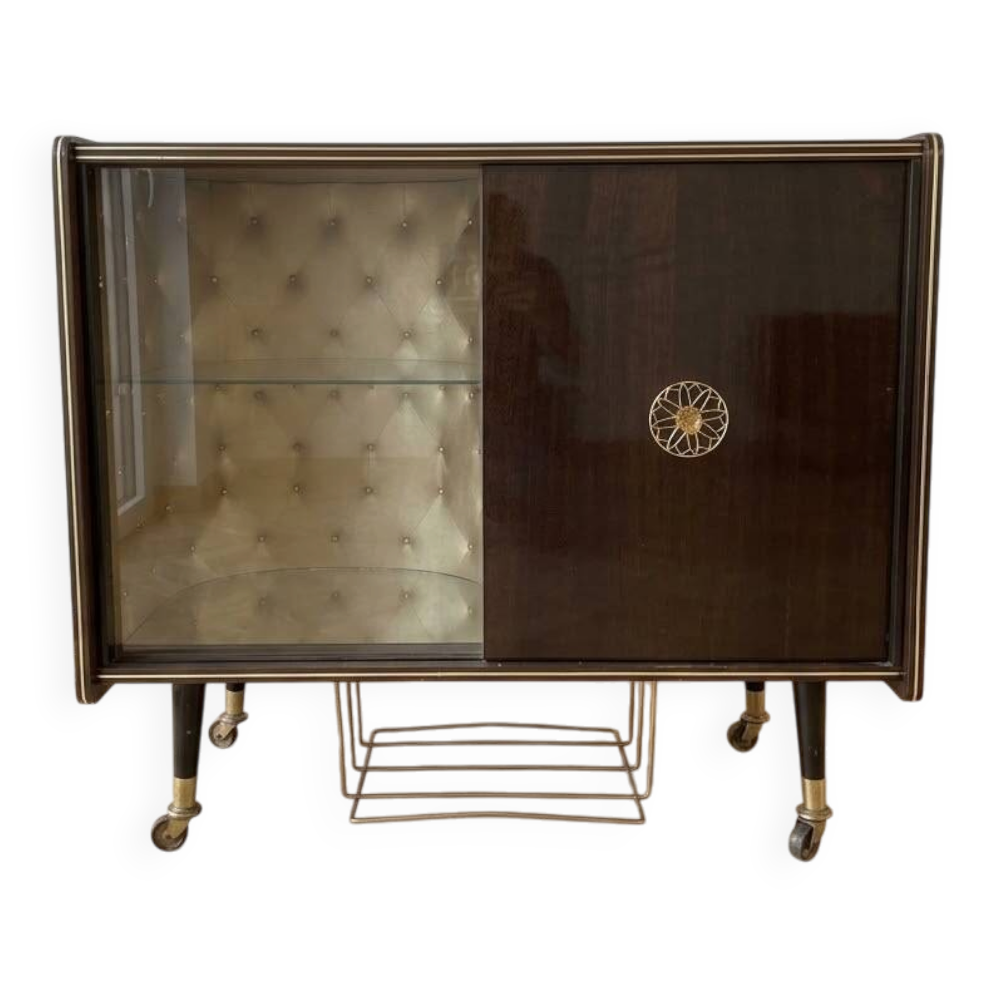 Vintage 1950s TV cabinet in wood with gold details.