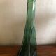Large free-form green blown glass bottle