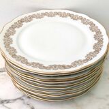 10 white and gold porcelain dinner plates