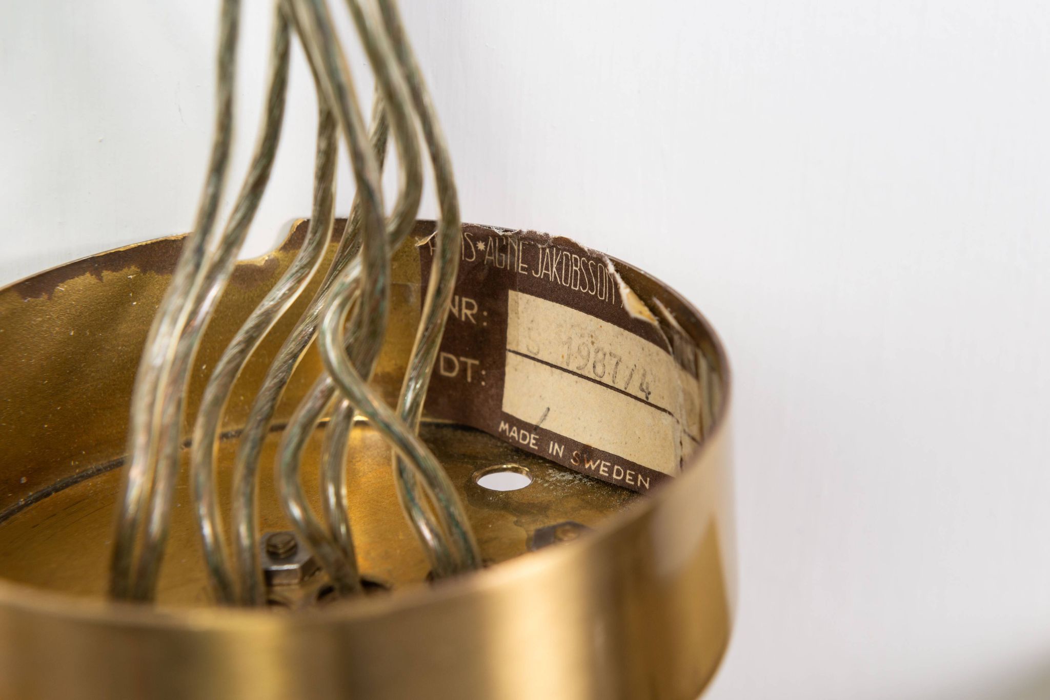 Hans Agne Jakobsson wall lamp made from brass with orange shades