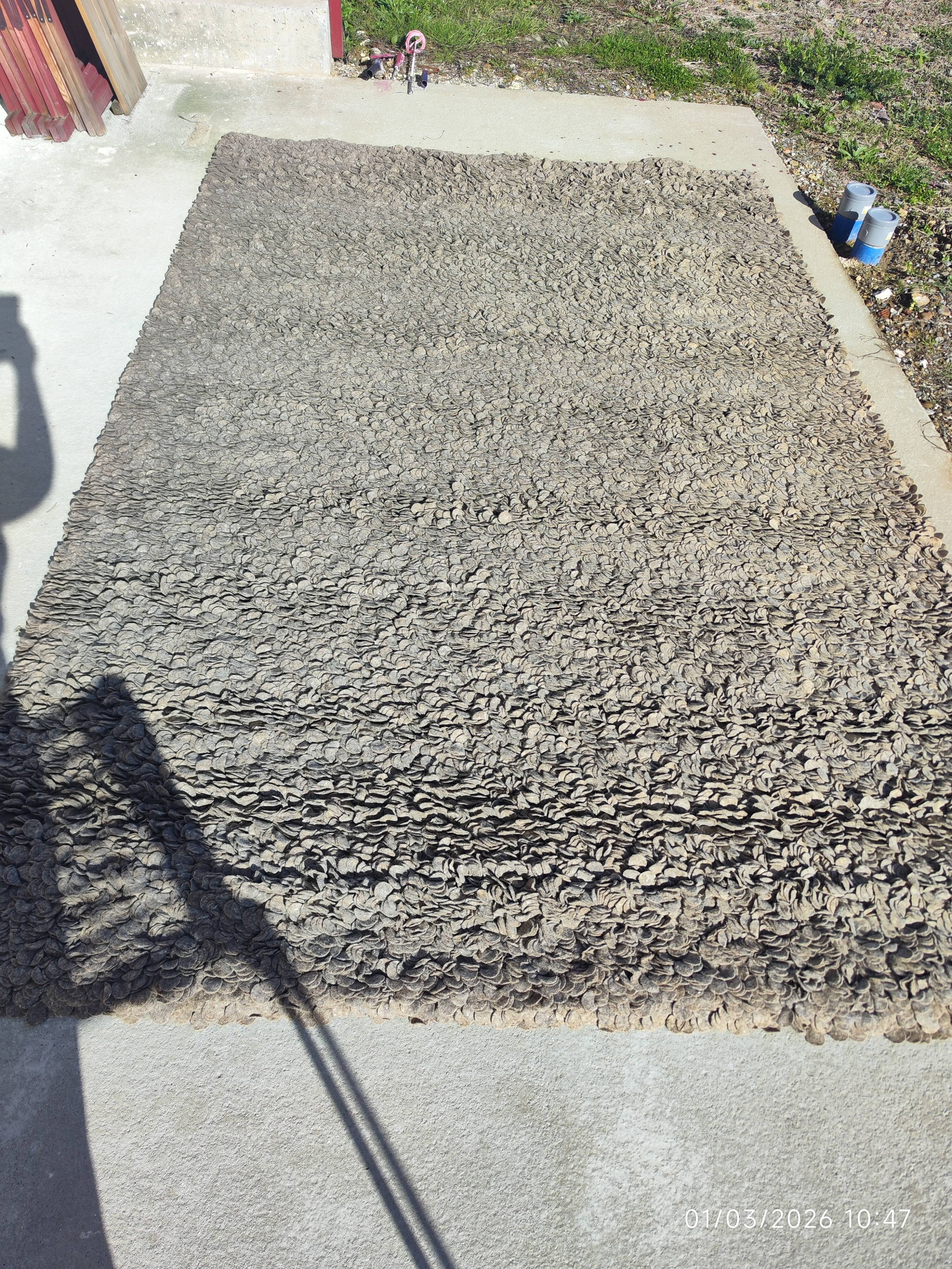 Rug in the style of a designer.