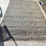 Rug in the style of a designer.