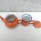 Orange enamelled coffee maker