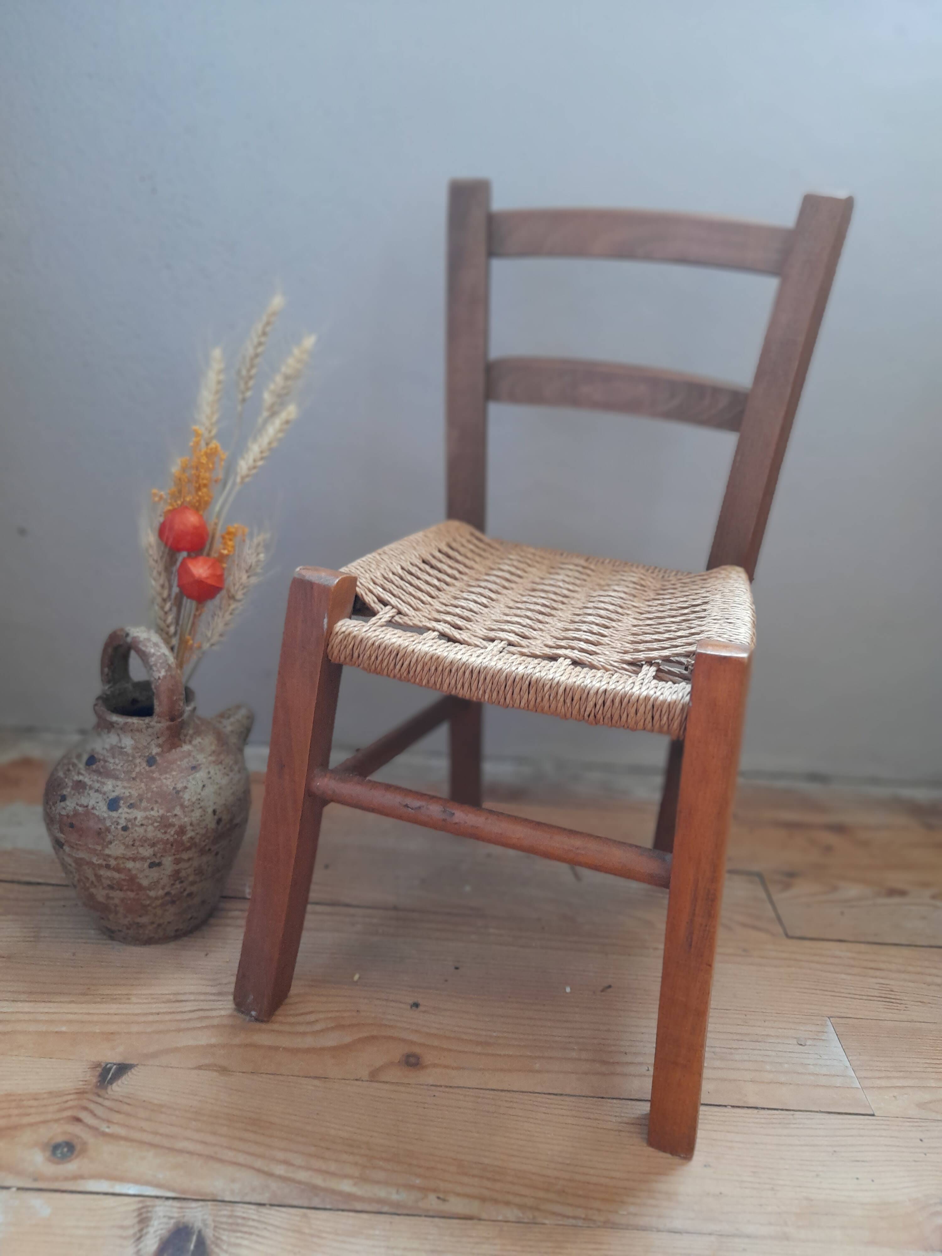 Wooden children's chair, rope seat, circa 1950