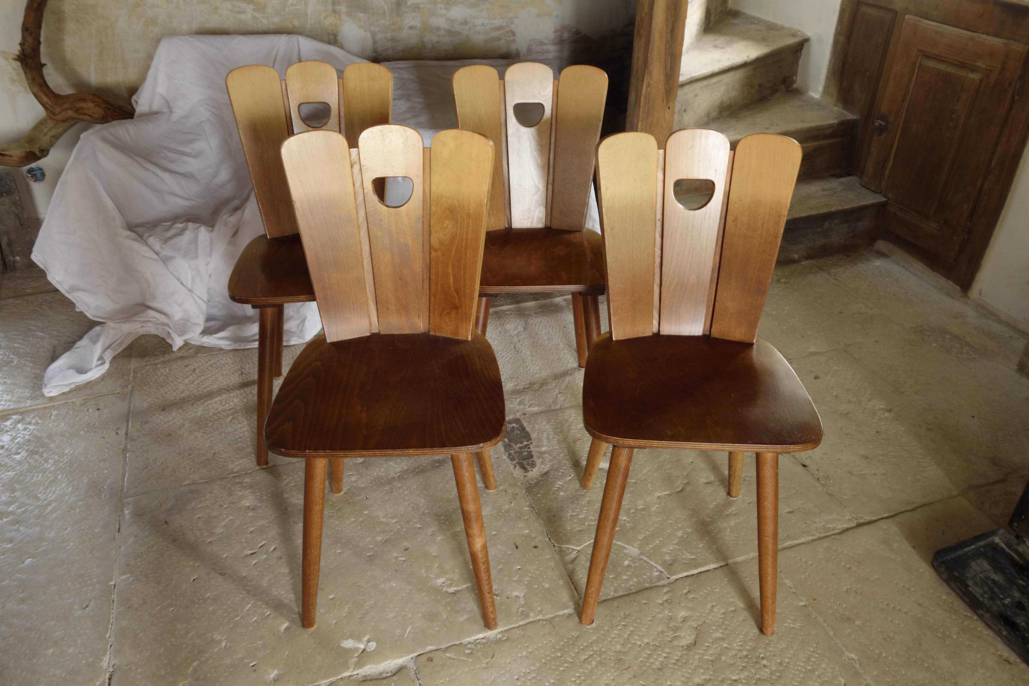 Scandinavian midcentury wooden chairs.
