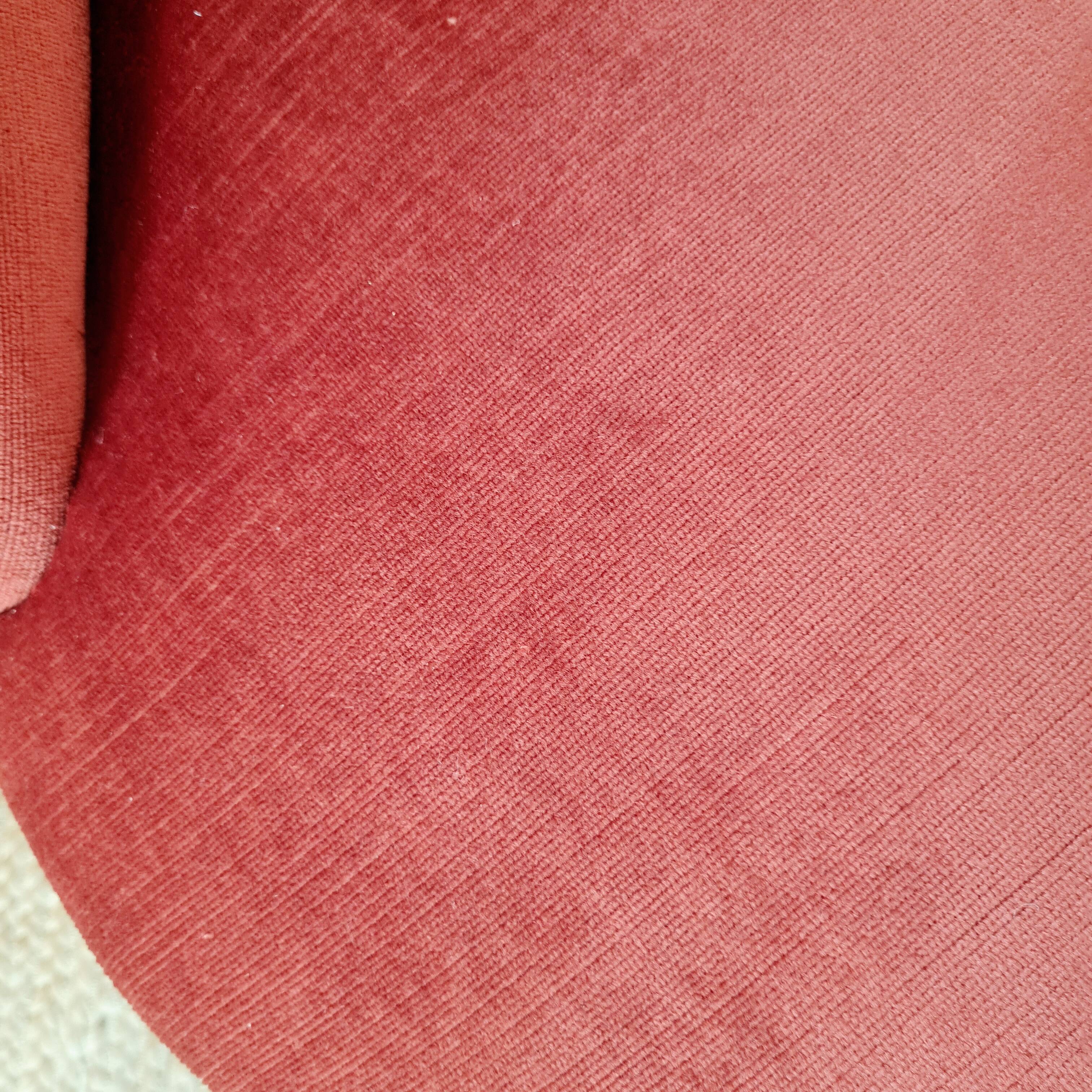 Red velvet toad armchair with fringes