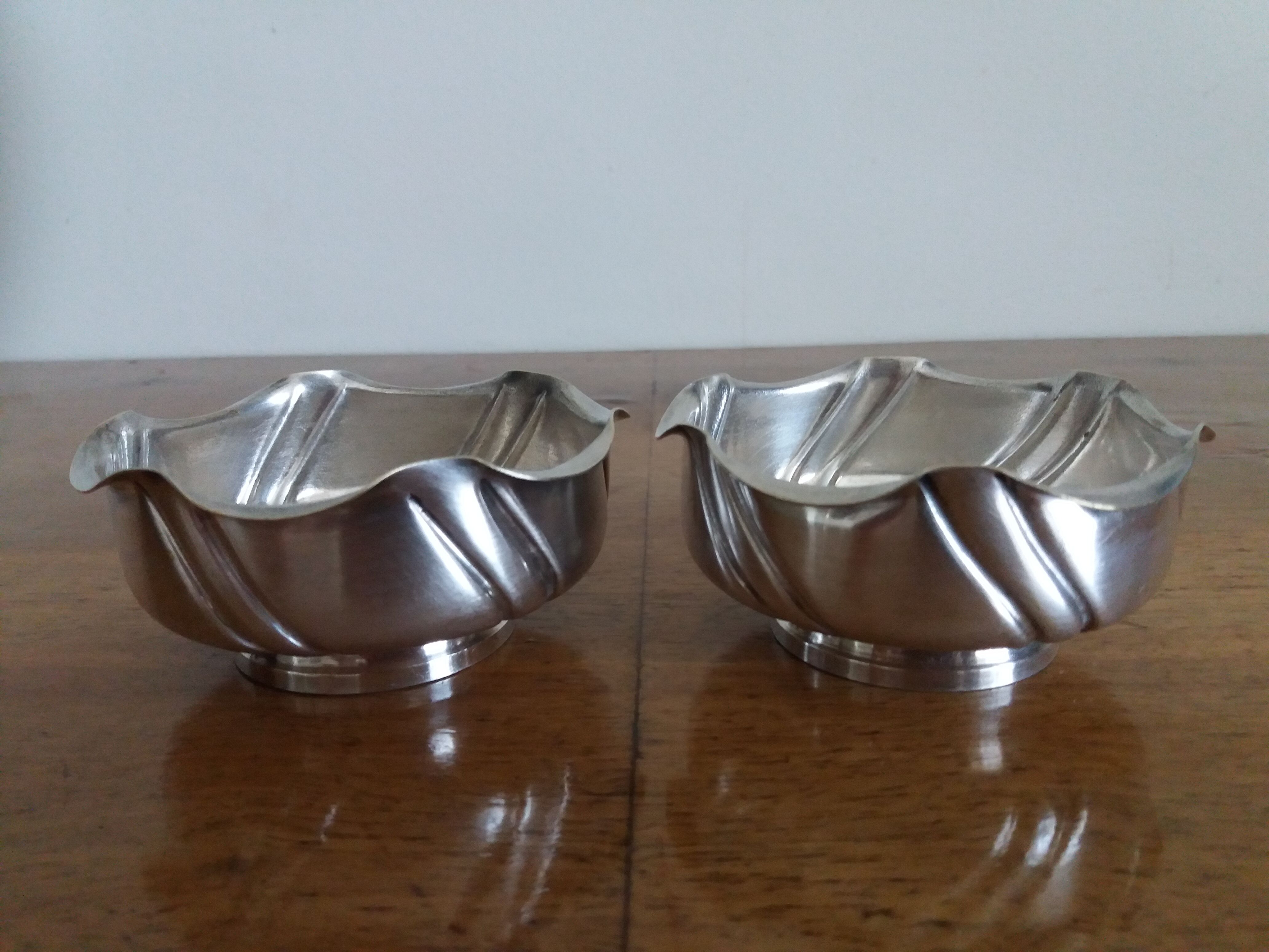 PAIR OF ART DECO SILVER-PLATED CUPLES