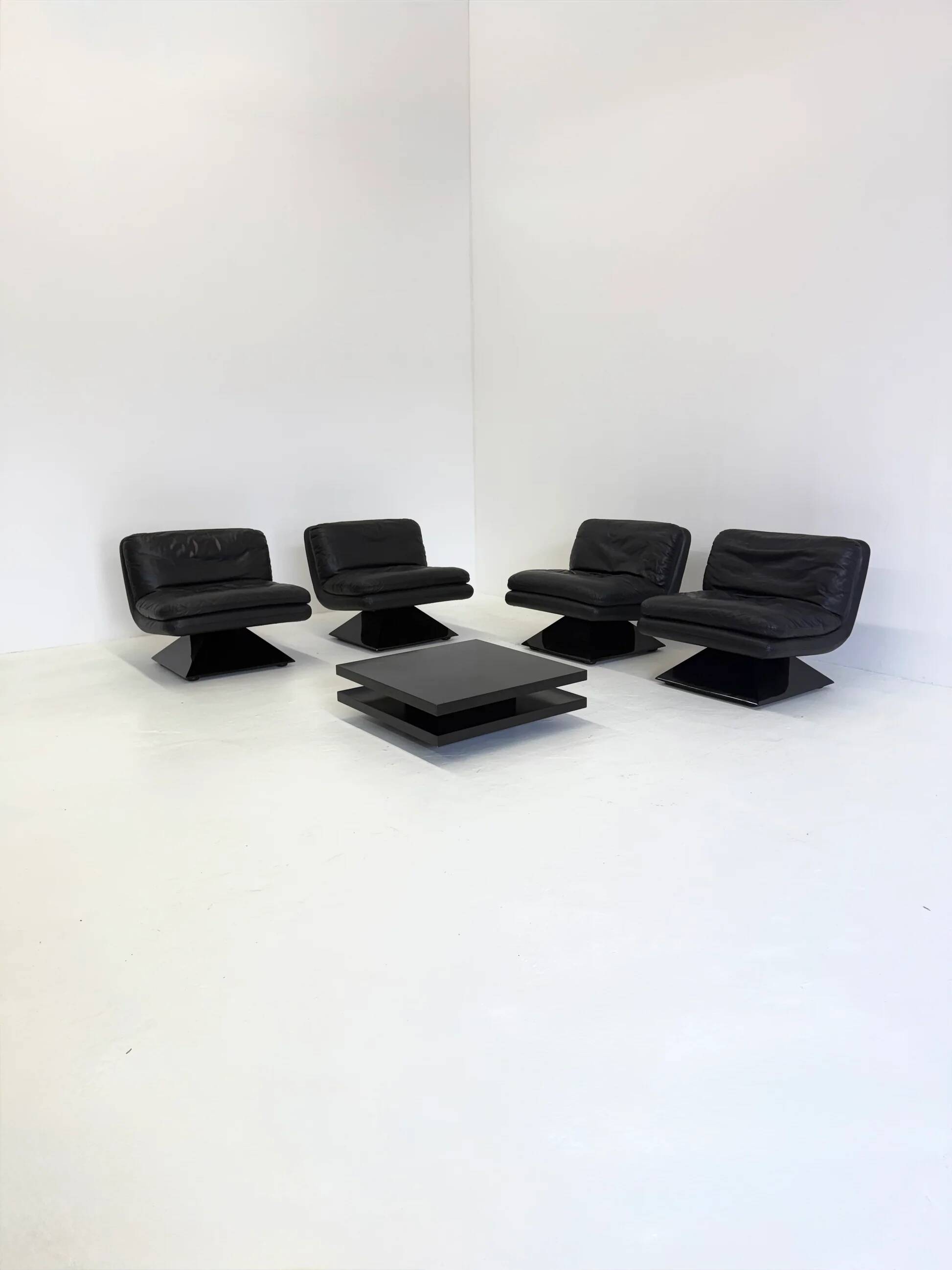Set of four Hans von Klier armchairs with coffee table for Giuseppe Rossi di Albizzate