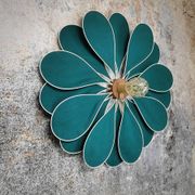 Emerald green rattan and linen flower wall light with 16 petals
