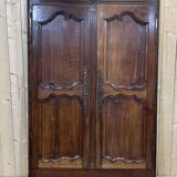 Louis XV cabinet façade in nineteenth century walnut.