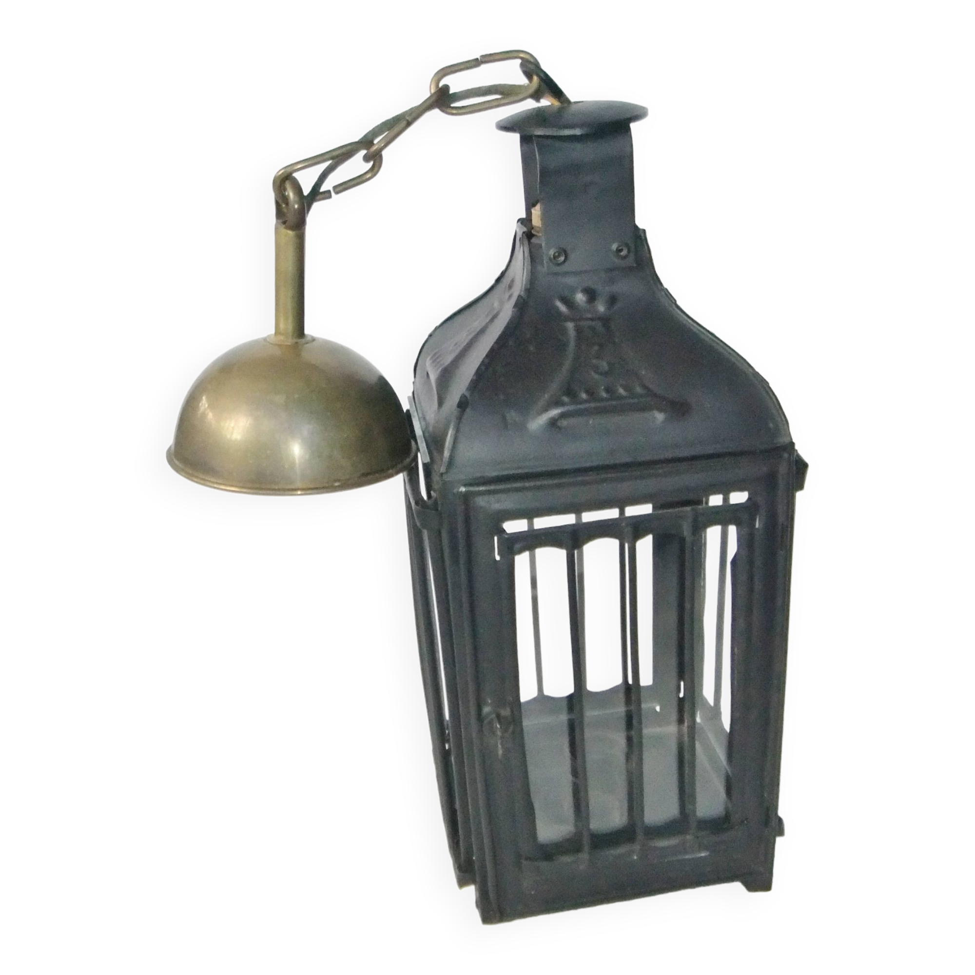 Old chandelier hanging lantern with candle in sheet metal