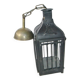 Old chandelier hanging lantern with candle in sheet metal