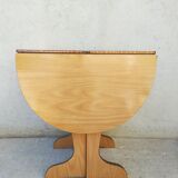 Oval table with formica flap