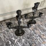 Pair of bronze candlesticks with a black patina in the antique style