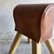Vintage 1960s Belgian pommel horse — brown leather vault on natural wood legs