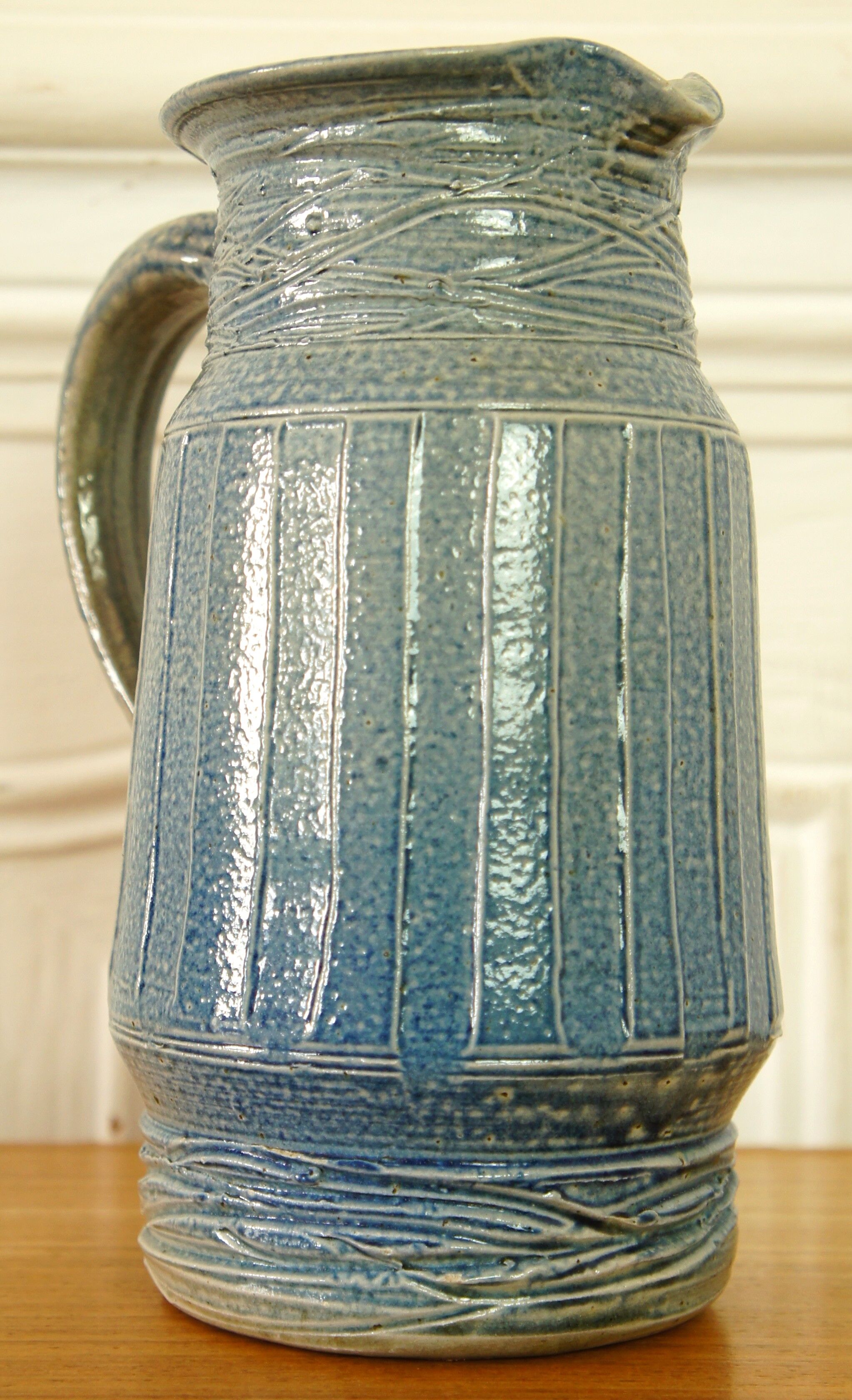 Signed blue sandstone pitcher