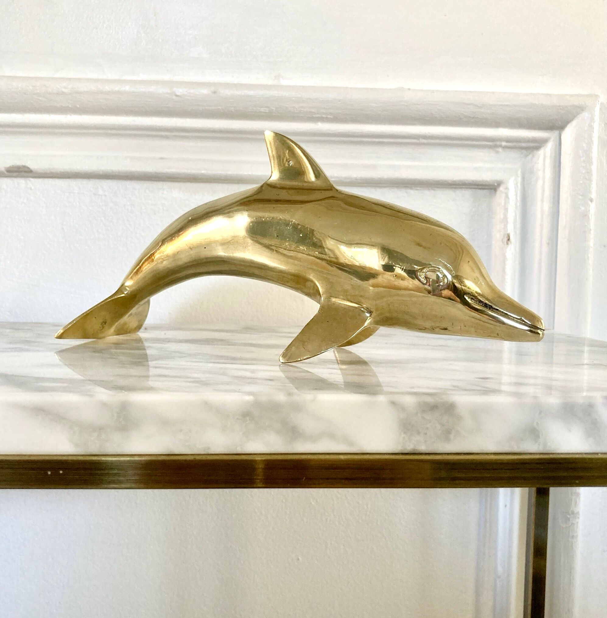 Vintage brass dolphin