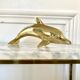Vintage brass dolphin