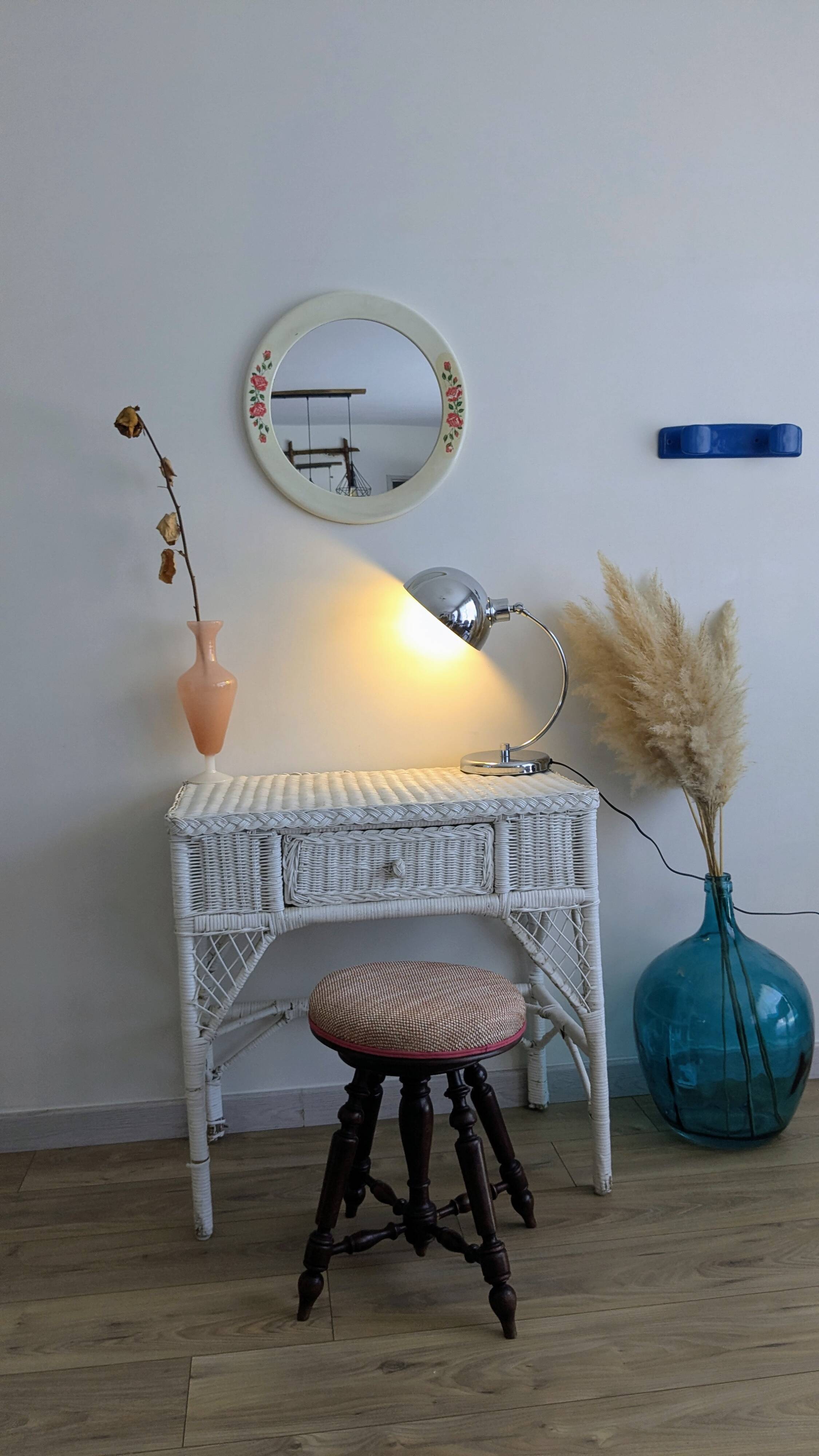 Vintage round mirror Syla model 6131 with rose decoration.