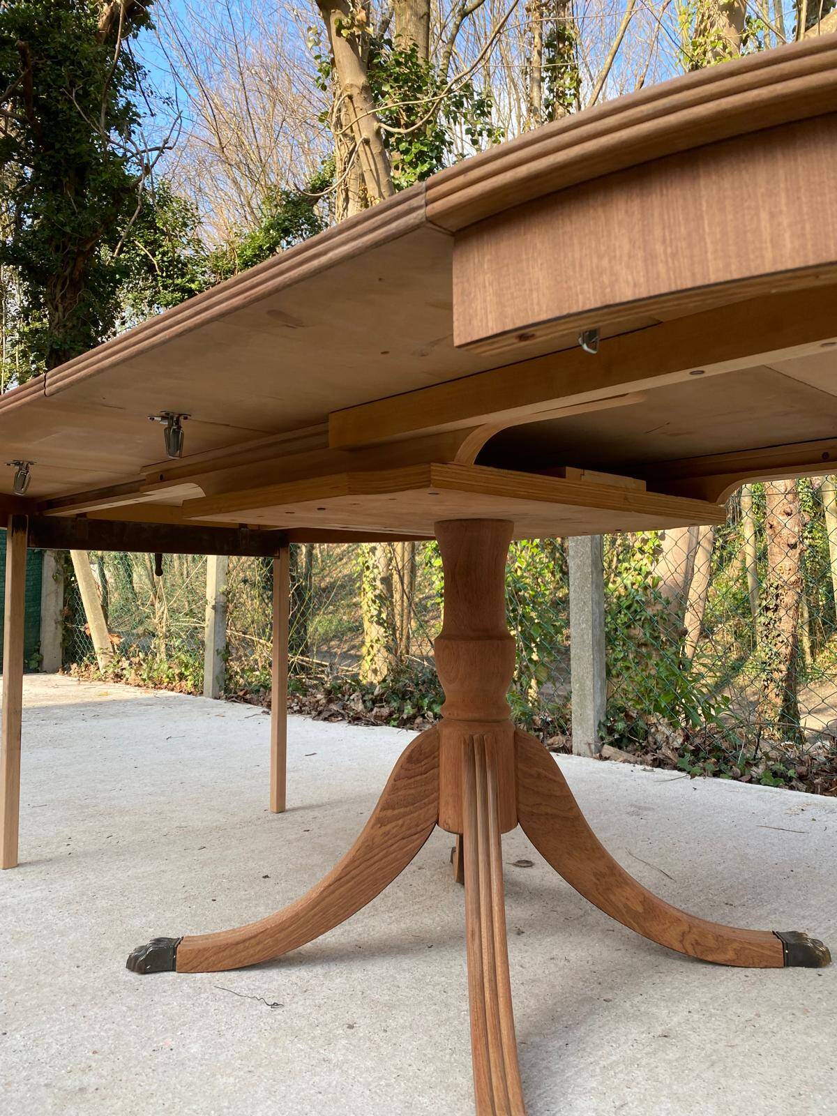 Extendable round dining table with central leg renovated in raw wood 205cm