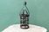 Riveted wrought iron cage suspension