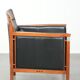 Fauteuil en cuir noir de style Art Déco en bon état.