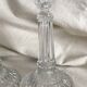 Column candle holders in moulded glass made in France.