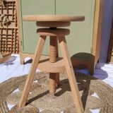 Vintage wooden stool with screws