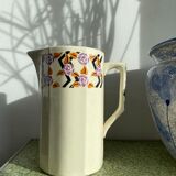 Porcelain pitcher with floral motifs