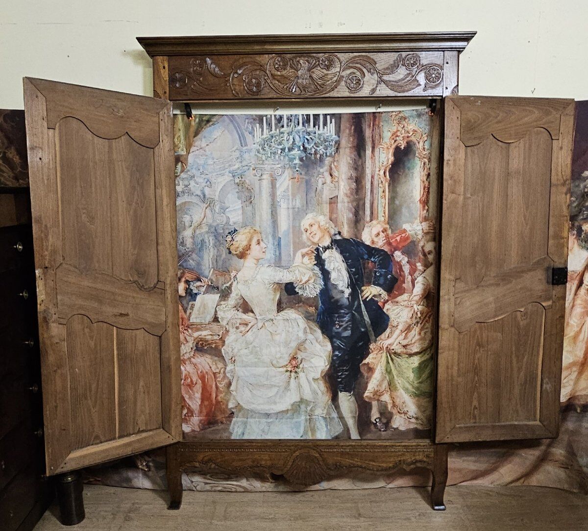 Louis XV period wardrobe façade, solid wood architectural elements, richly carved.