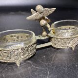 Spice centerpiece and serving spoon topped with a brass cherub