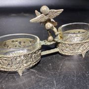 Spice centerpiece and serving spoon topped with a brass cherub