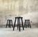 Set of three vintage stools in black lacquered wood.
