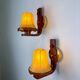 Paire de lampes murales "Cocoon" italiennes, en résine et bois, années 1970.