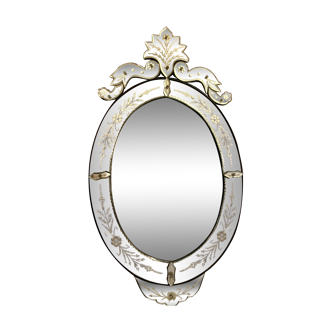 Oval Venetian mirror with close-bezel, early 20th century, flower decoration