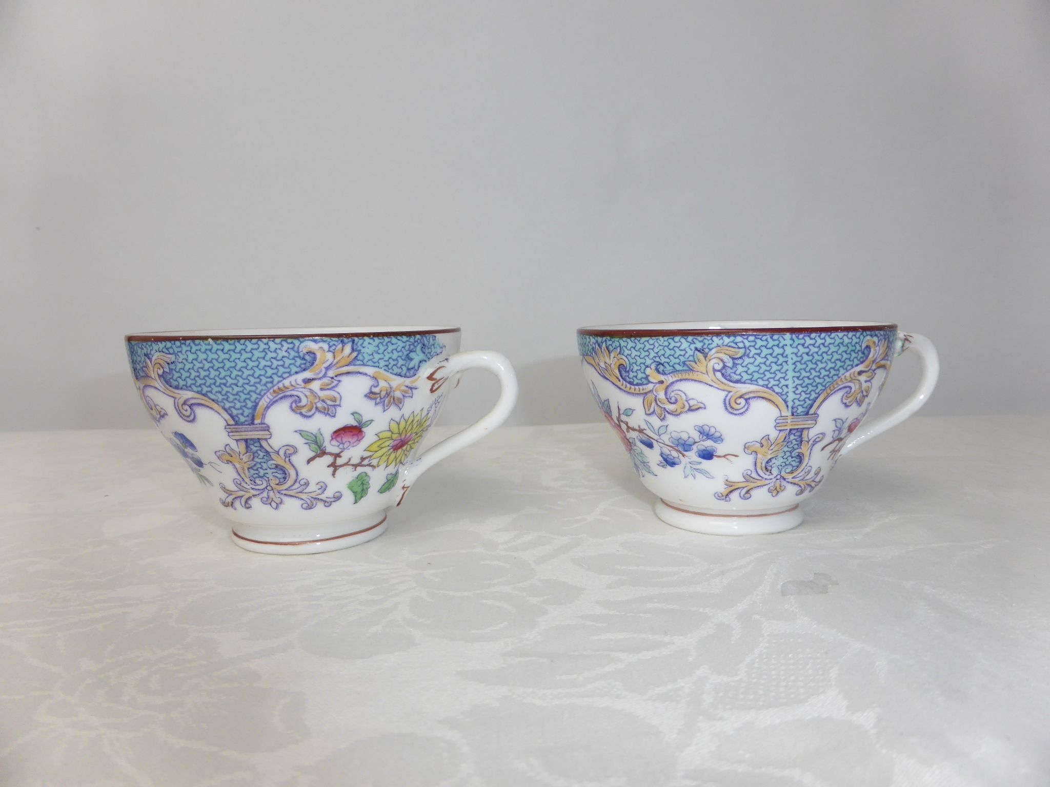 Pair of Rörstrand porcelain coffee cups with Japanese floral decoration