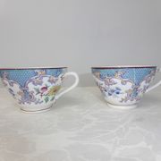Pair of Rörstrand porcelain coffee cups with Japanese floral decoration