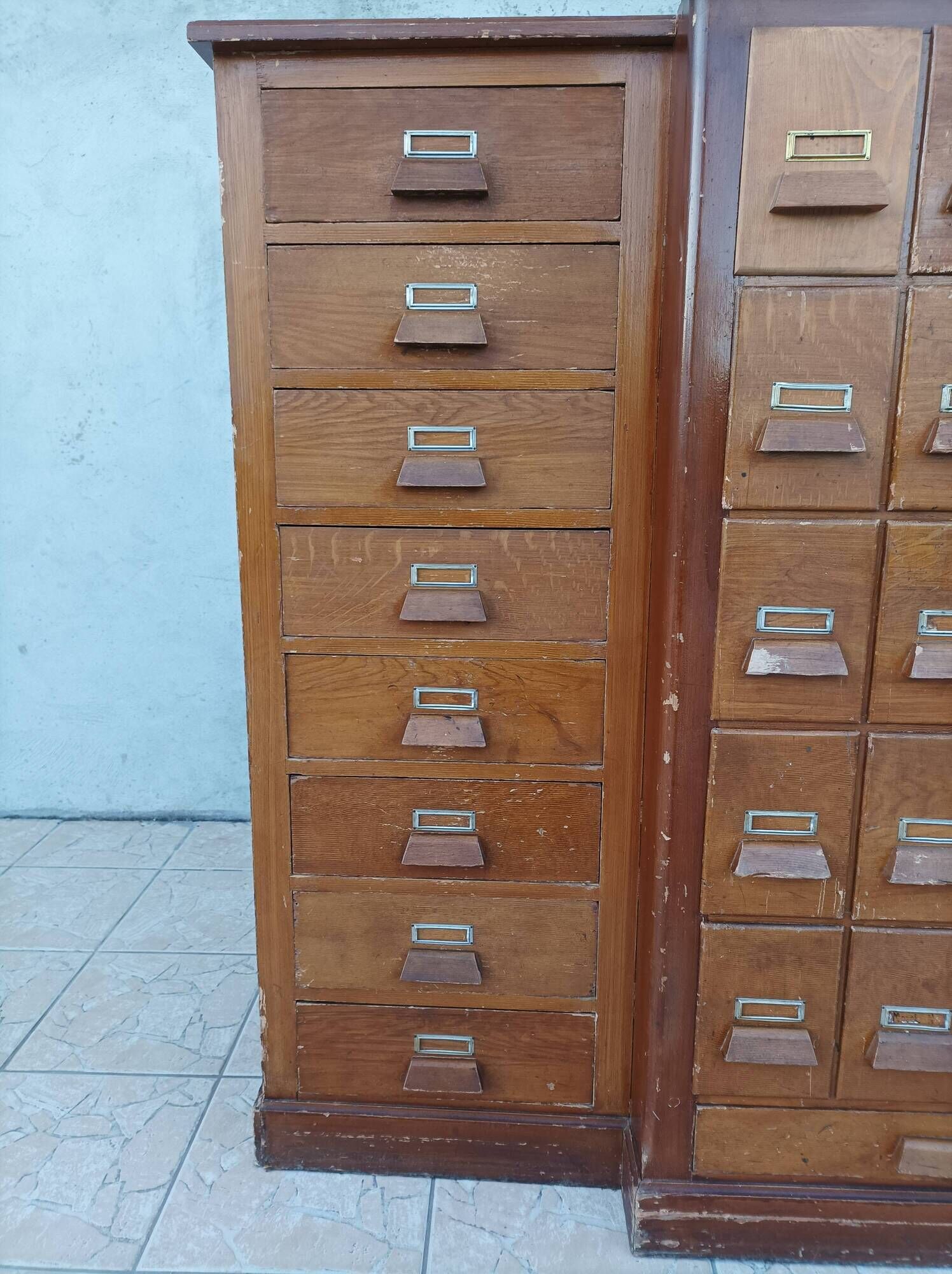 Apothecary or trade cabinet in fir with 53 drawers.