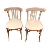 Pair of painted white bistro chairs