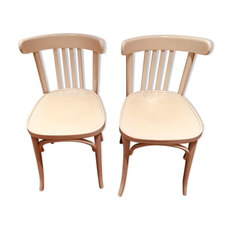 Pair of painted white bistro chairs