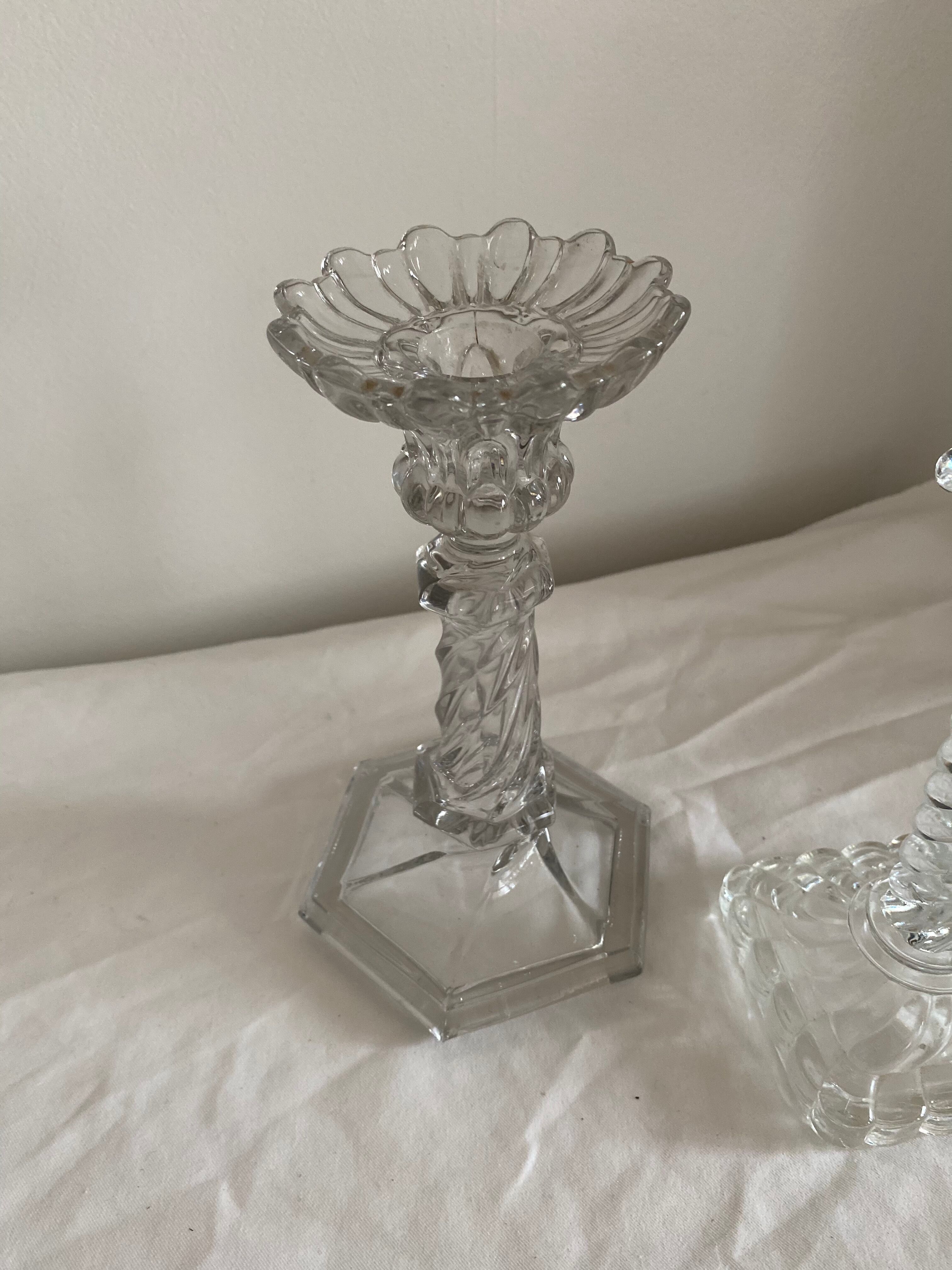 Duo of glass candlesticks