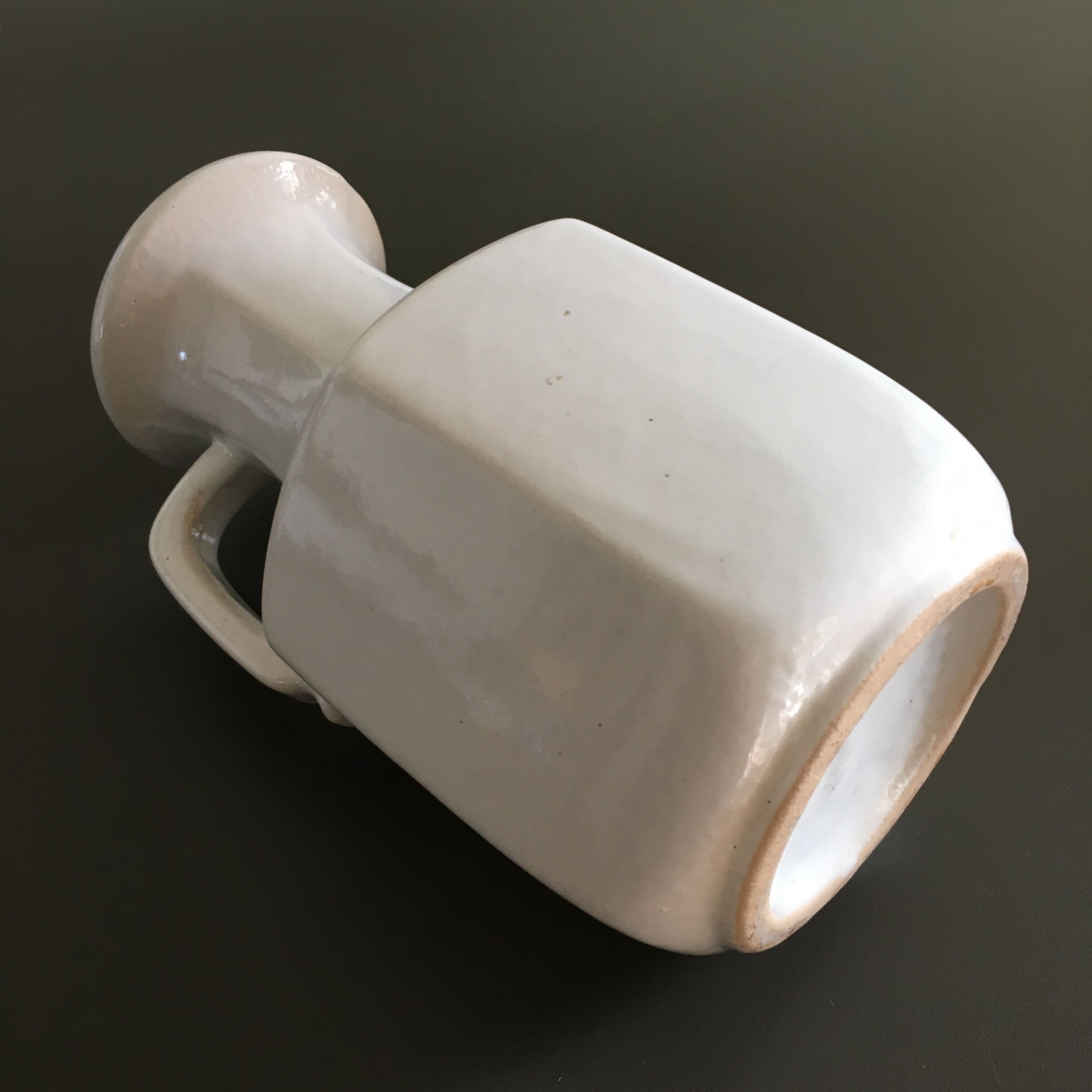 Ivory vase with handle