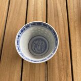 Asian teapot in basket