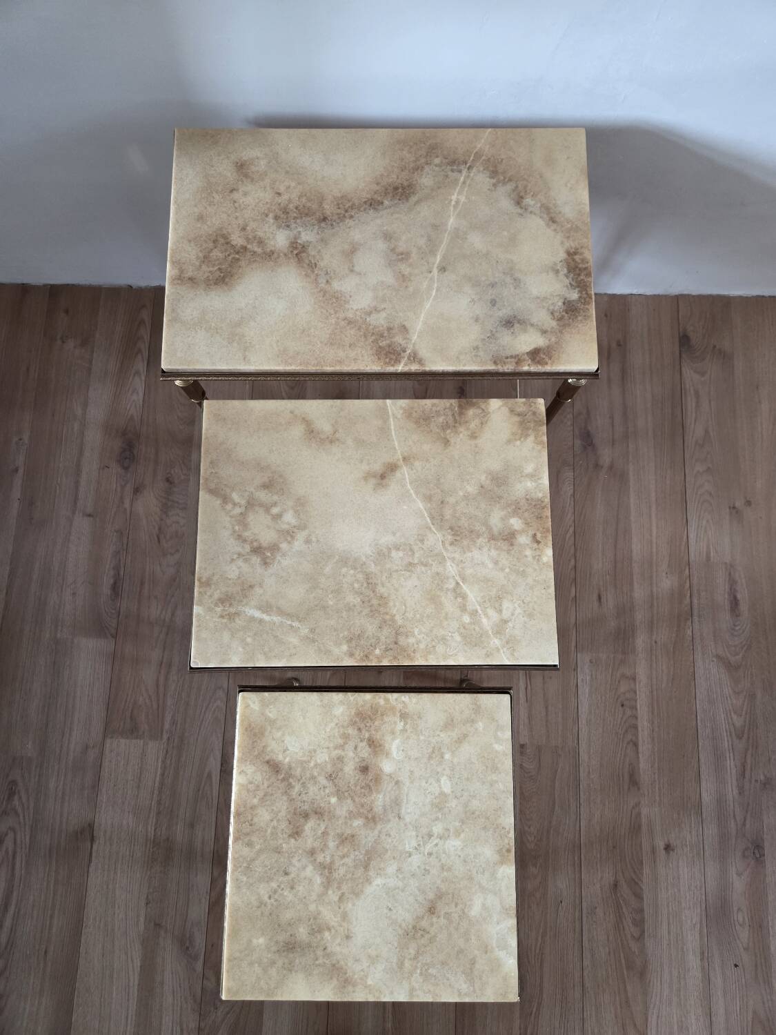 Nested tables in brass and marble, 1950.