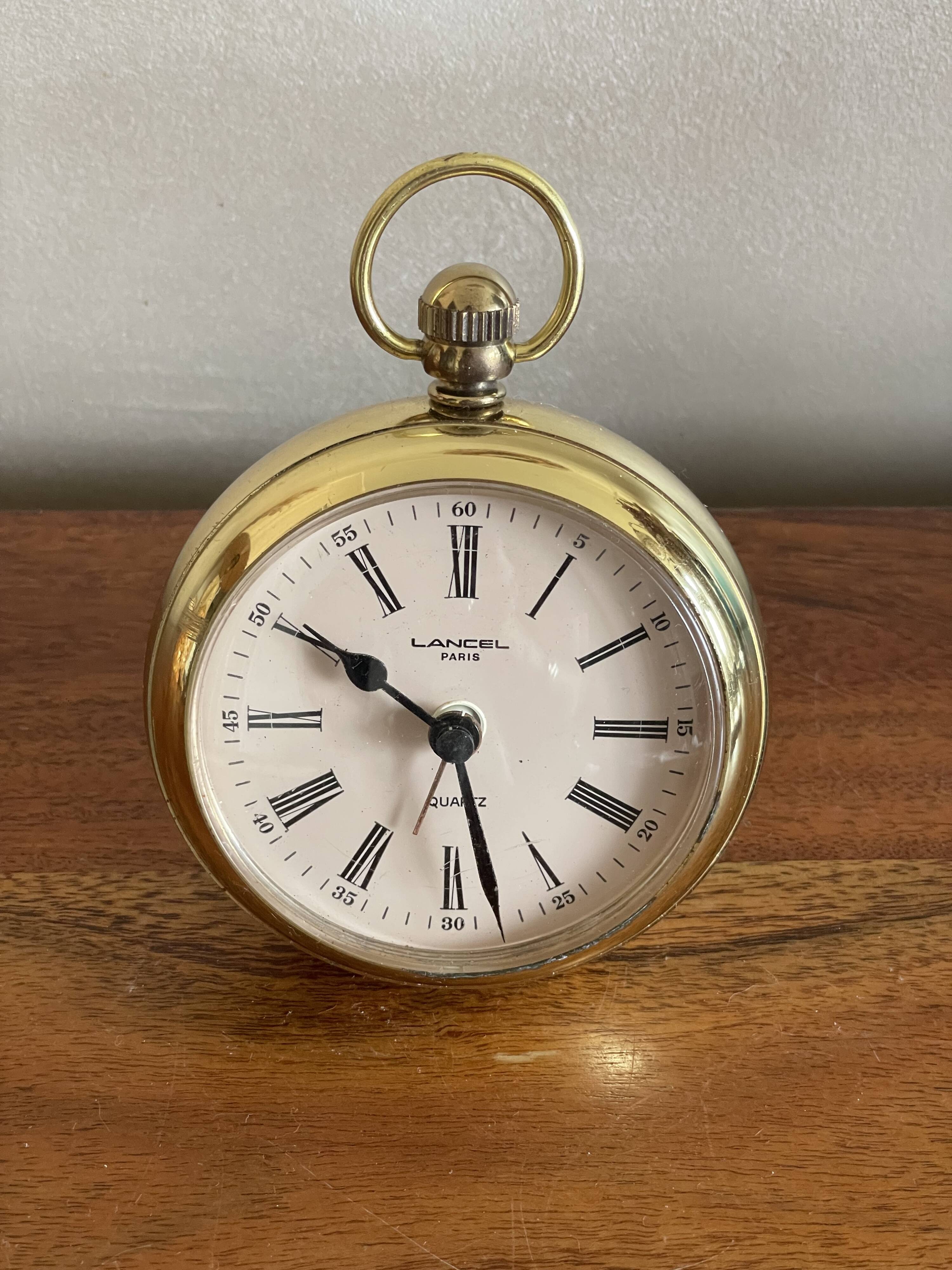 Lancel alarm clock pocket shape