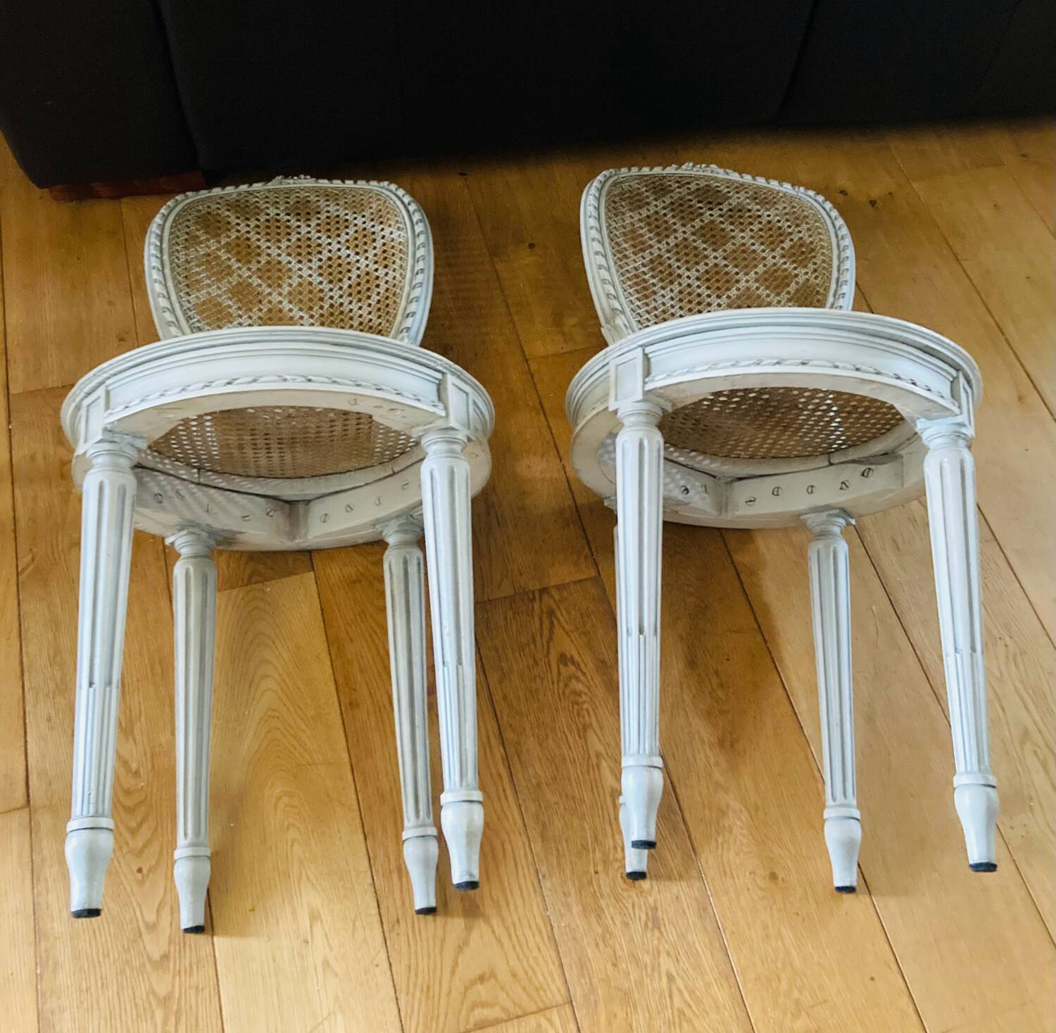 Pair of Louis XVI chairs from the late 19th century with checkerboard caning