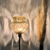 Table lamp with an old vintage golden lampshade