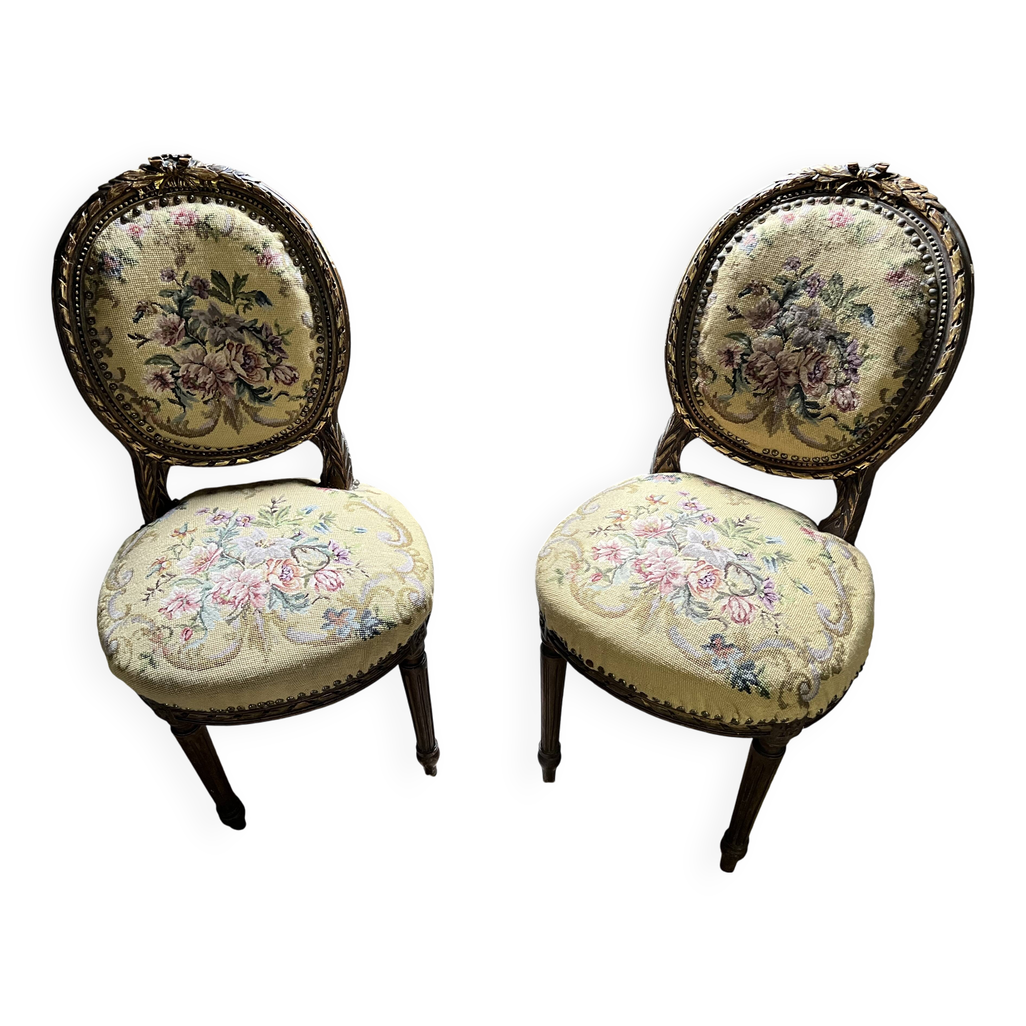 pretty pair of Louis XVI style chairs, in carved and gilded wood