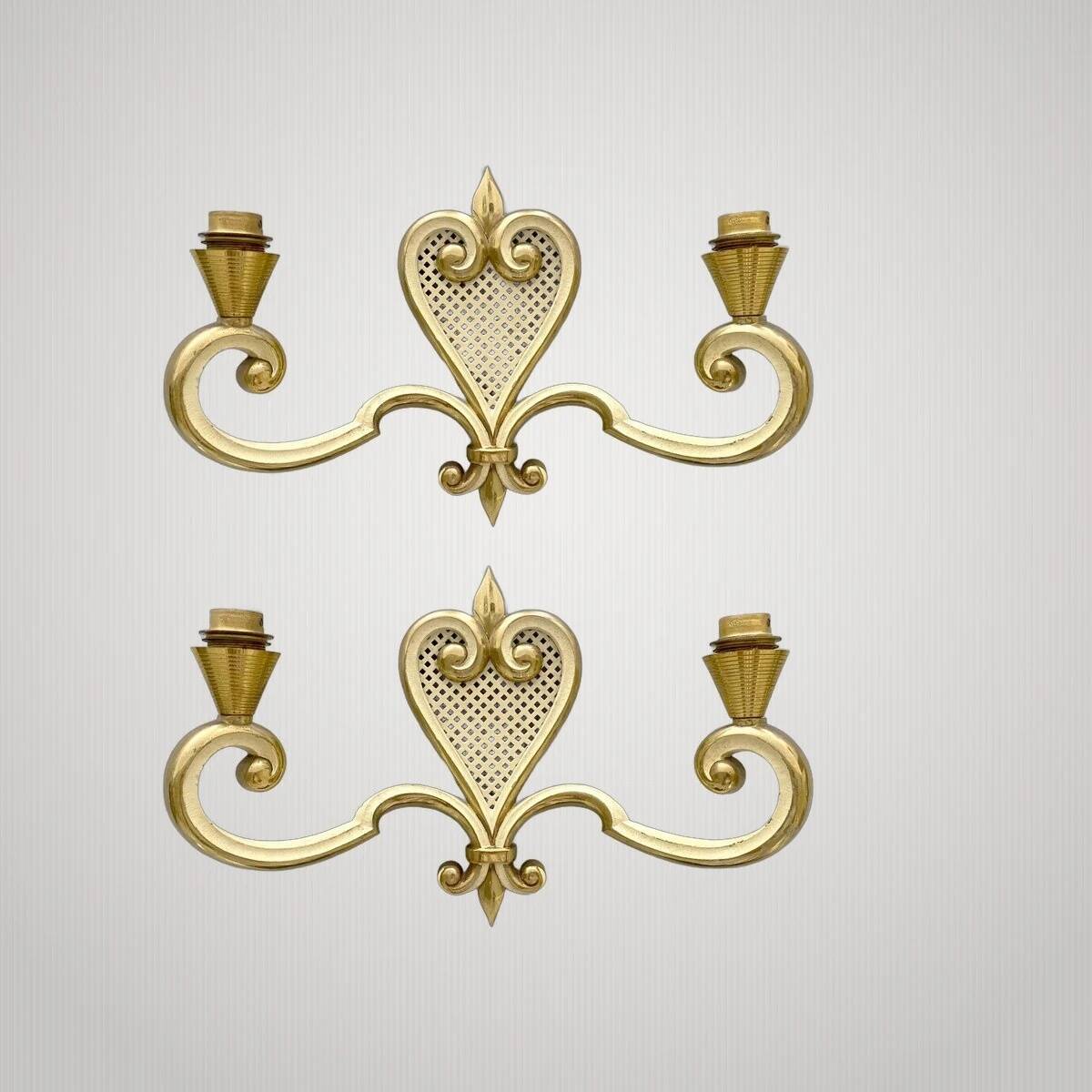 Pair of wall lights from the 1950s by Maison Arlus.